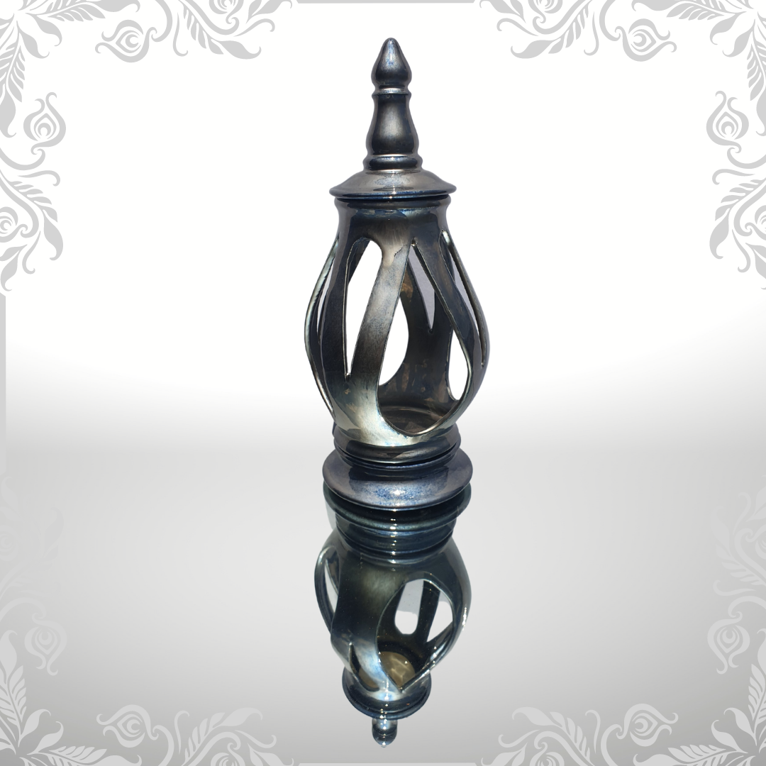 Beautiful silver cut out candle urn
