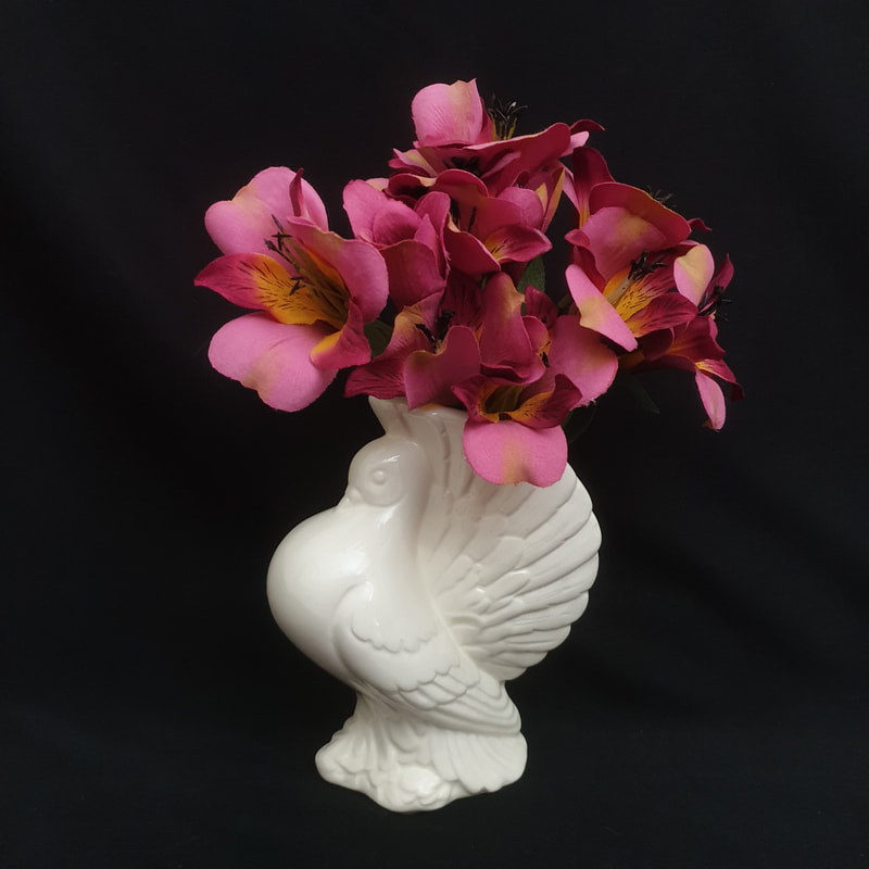 Glossy White dove vase with pink flowers