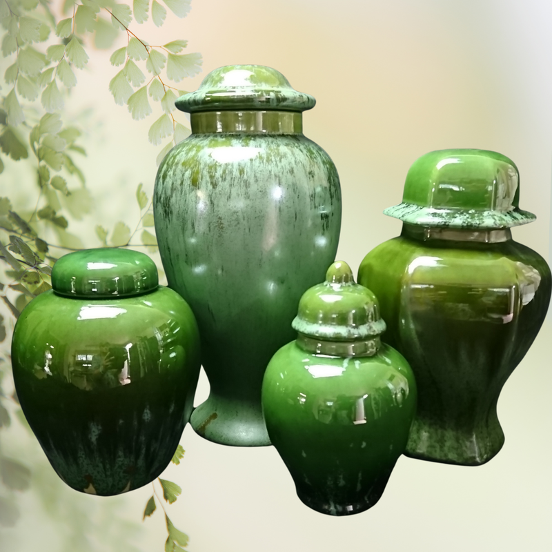 4 Urns with glossy bright green blaze with accents of a lighter green.