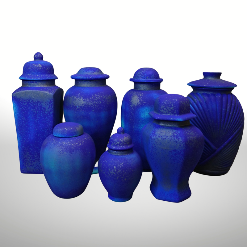 Various sized urns with the same purple glaze called Window to the soul